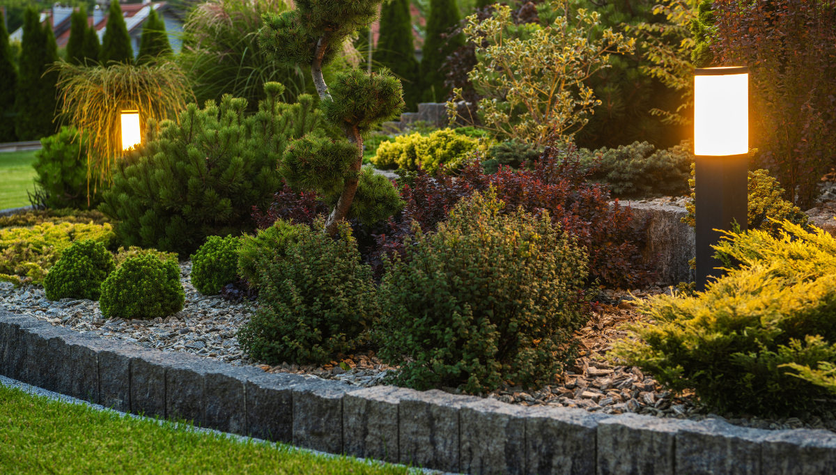 Lights installed in a landscaped garden area.